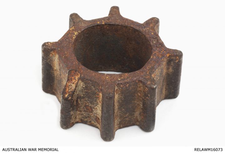 A rusted cog wheel