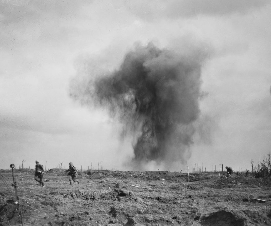 Smoke rising from a barren Ypres battlefield