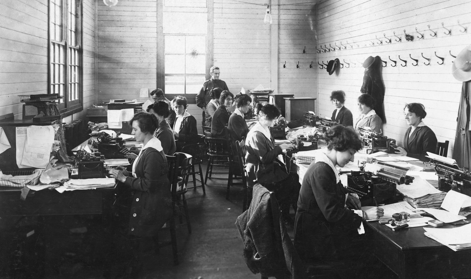 Female clerks seated, working at the Base Records Office in Melbourne