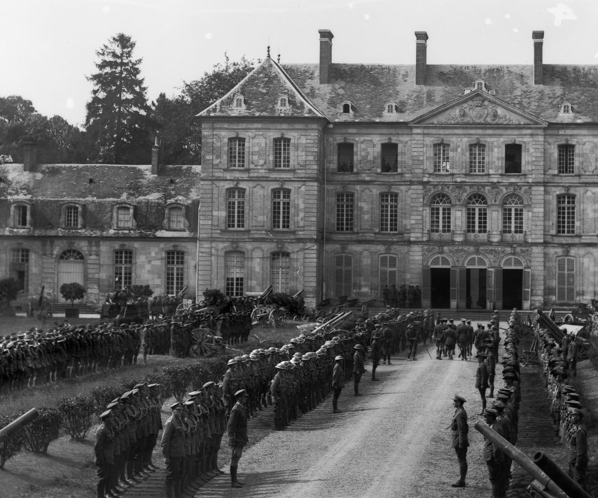 Australian troops in on parade in front of Château de Bertangles while it was commissioned as the headquarters for General John Monash
