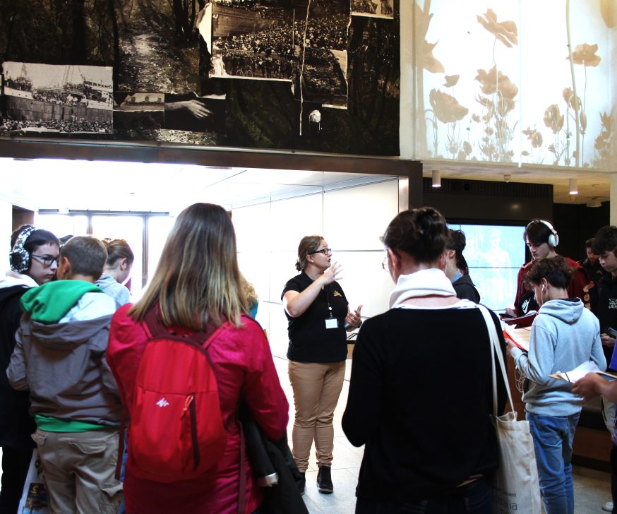 Students welcomed by a Visitor Services Officer at the Sir John Monash Centre.