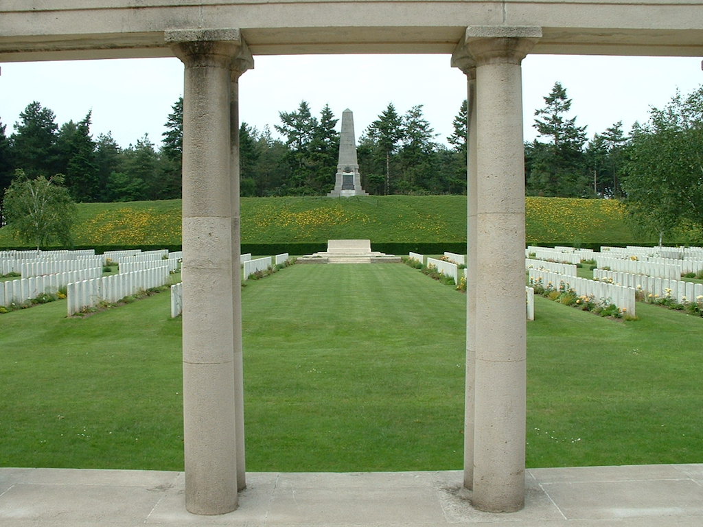 Buttes New British Cemetery, Polygon Wood, with the Australian 5th Division Memorial in the background ©CWGC