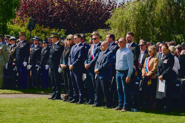 The official delegation standing during the Digger Ceremony.