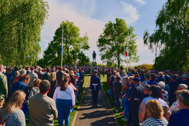 Members of the public gathered in front of the Digger Memorial at the start of the service.