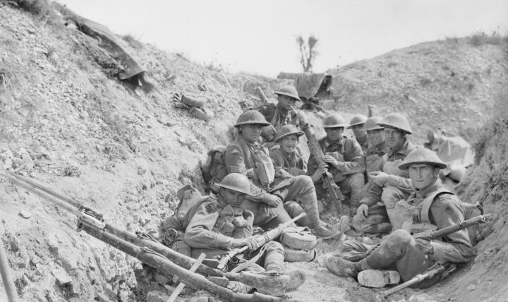 Members of the 24th Battalion in a trench about 1.20 p.m., awaiting the lifting of the artillery barrage before the renewed attack which led to the capture of Mont St. Quentin by troops of the 2nd Australian Division ©AWM E03138.